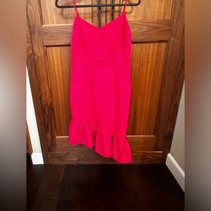 Pink formal dress.Angled bottom. Worn once for a wedding.Beautiful dress